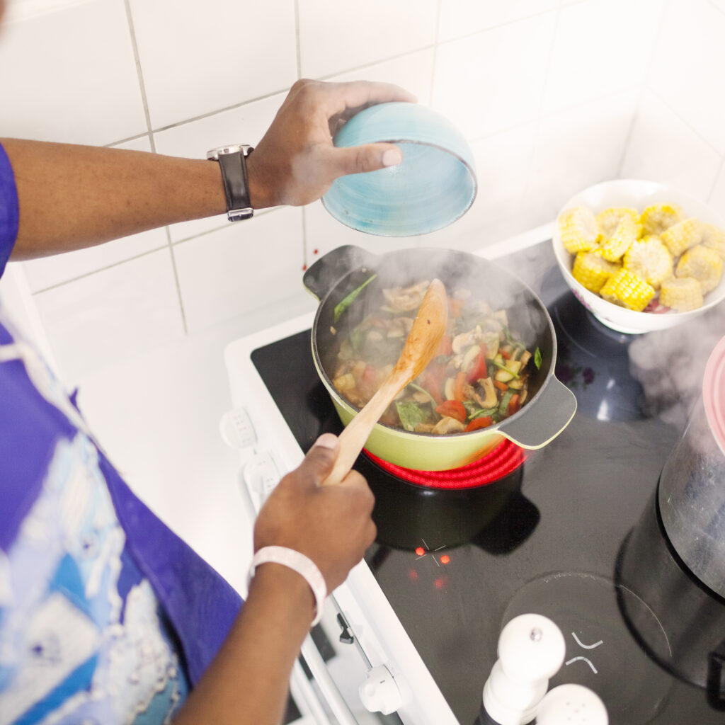High angle view of man preparing food in kitchen