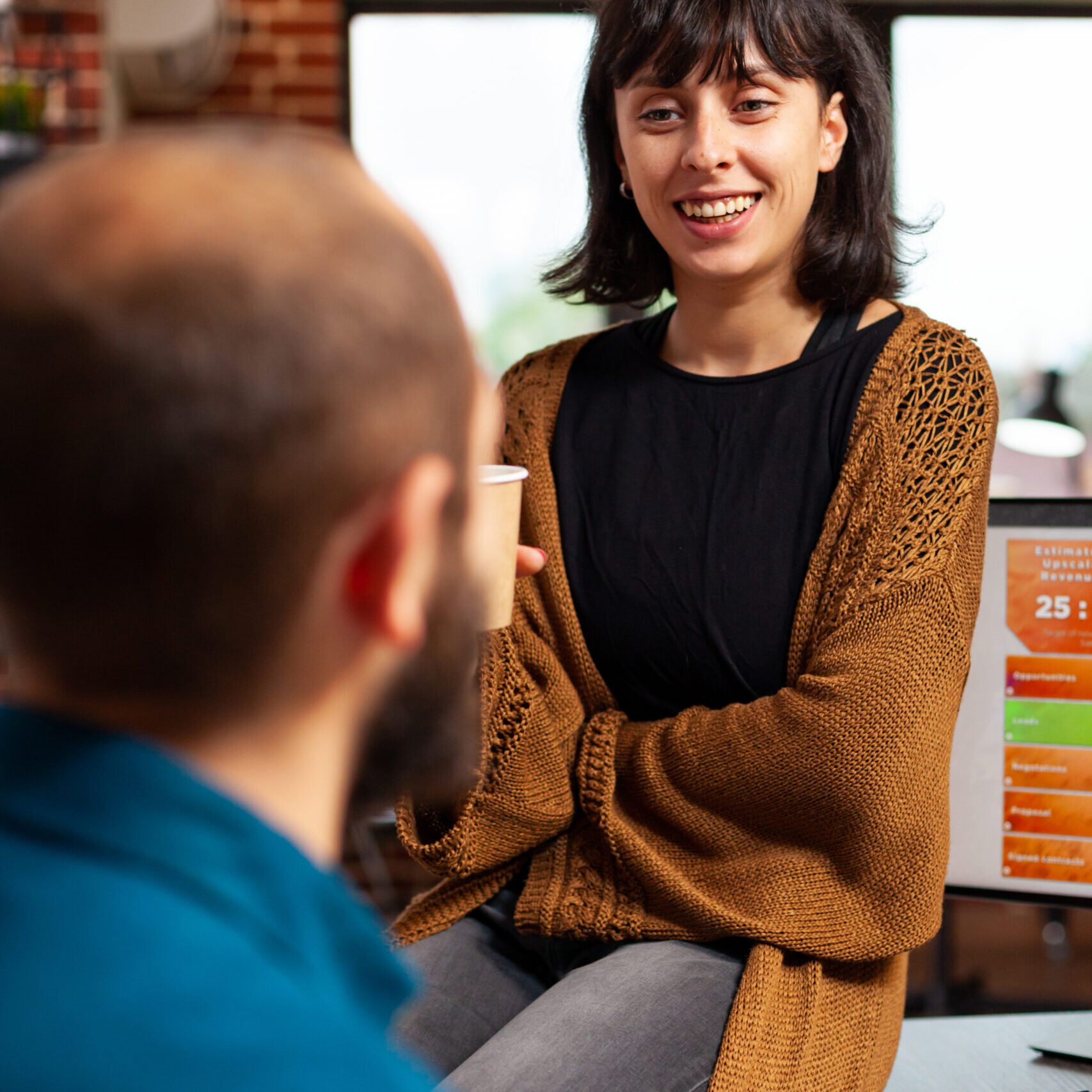 Businessman talking with manager woman discussing marketing strategy working at company presentation brainstorming ideas in startup office. Businesspeople planning business meeting